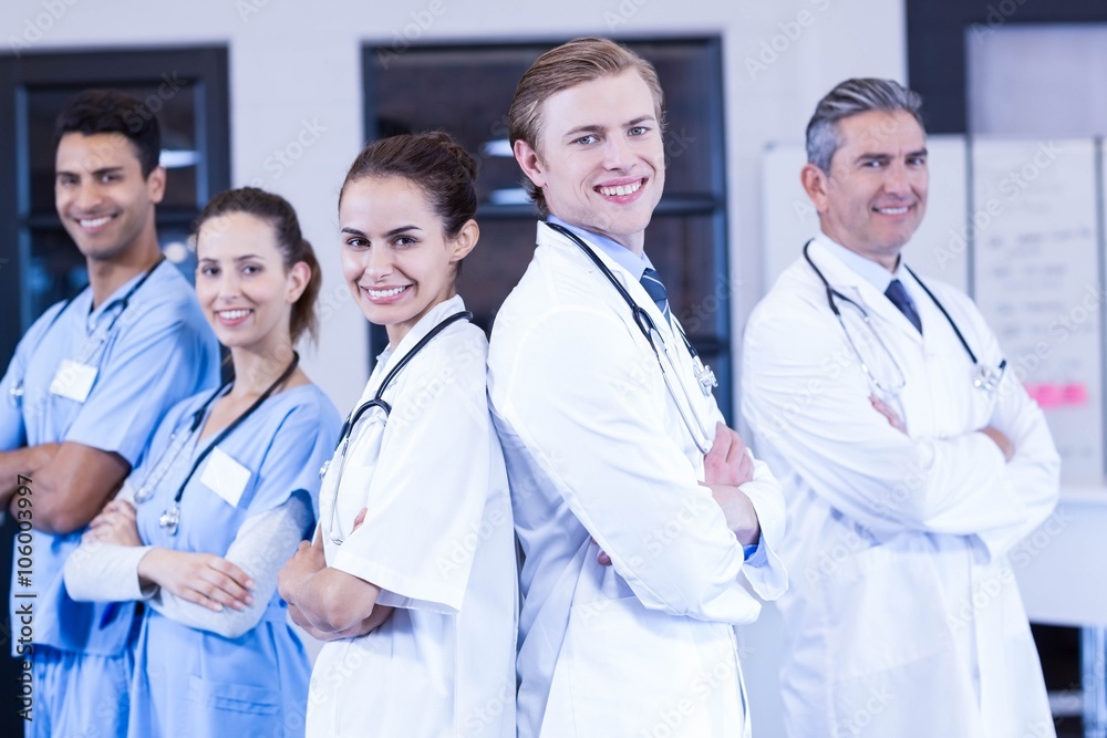 Portrait of medical team standing with arms crossed Portrait of medical team standing with arms crossed