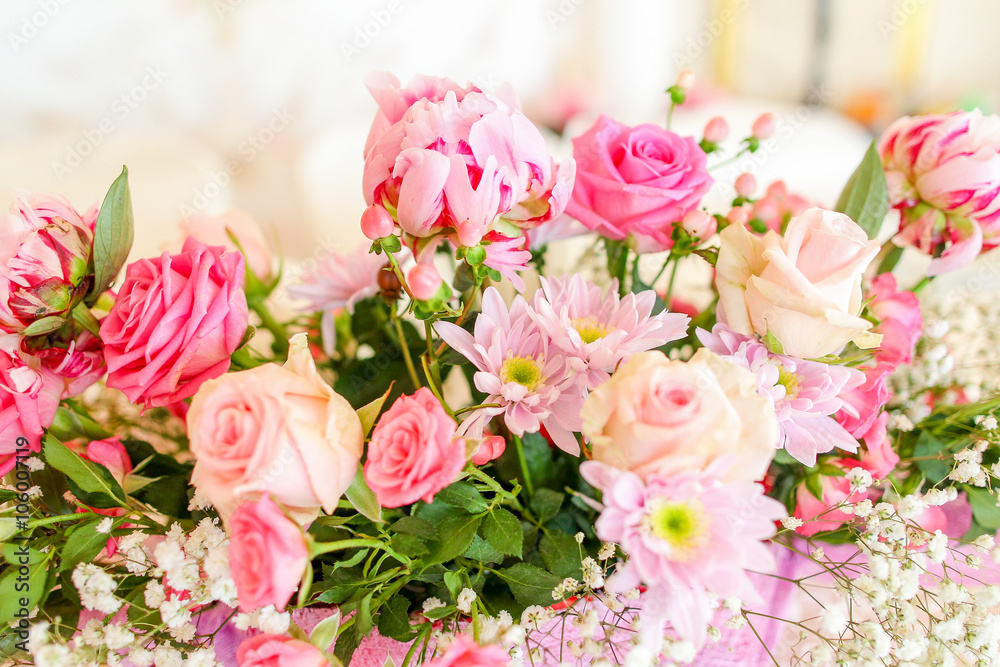 wedding bouquet with rose bush, Ranunculus asiaticus as a backgr