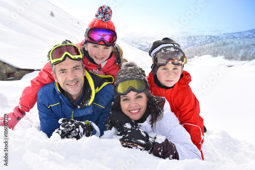 Portrait of family having fun in the snow
