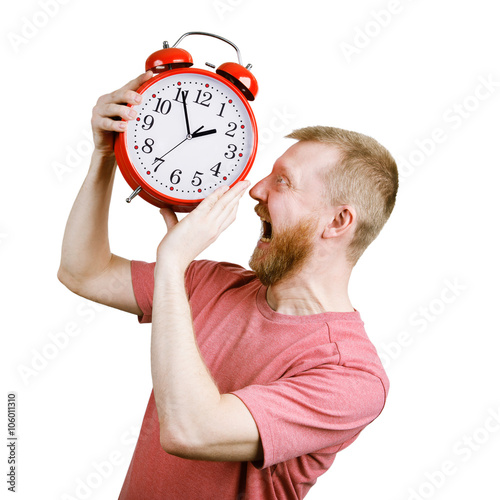 Resents a bearded man wants to eat an alarm clock photo