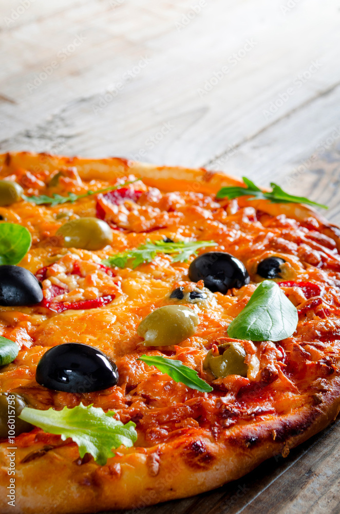 Pizza with salami and olives Pizza with salami and olives