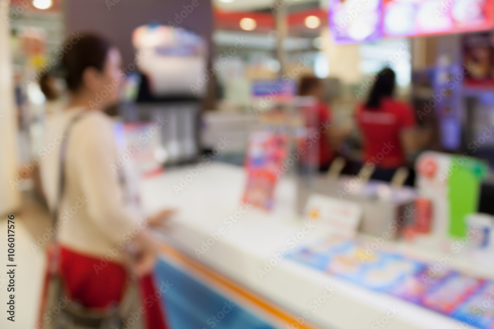 blur woman buying ice cream at store