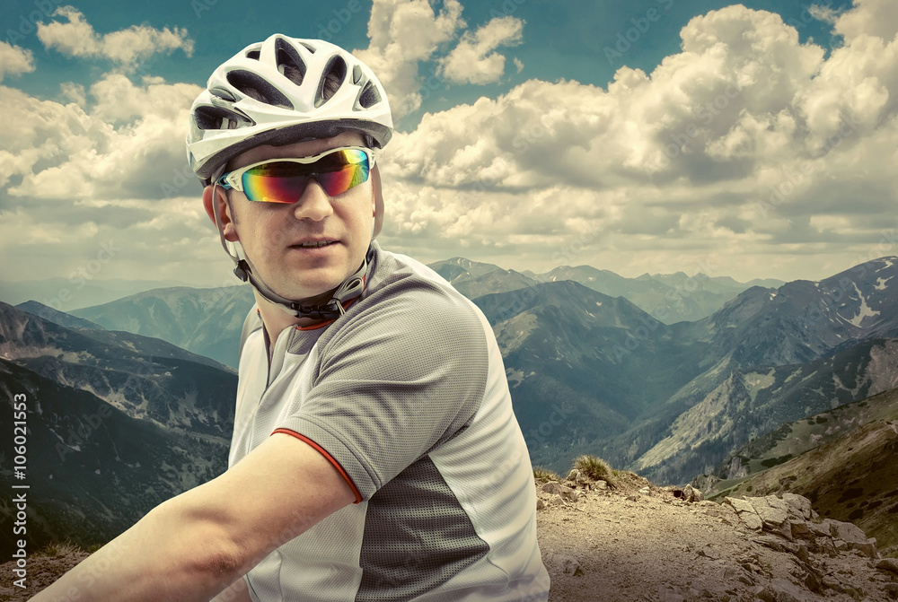 Men with bicycle aroun mountains beautiful view. Men with bicycle aroun mountains beautiful view.