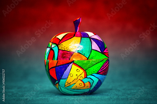 contemporary art, modern art. colorful wooden Apple. decorative fruit. Apple painted colors manually, handmade craft