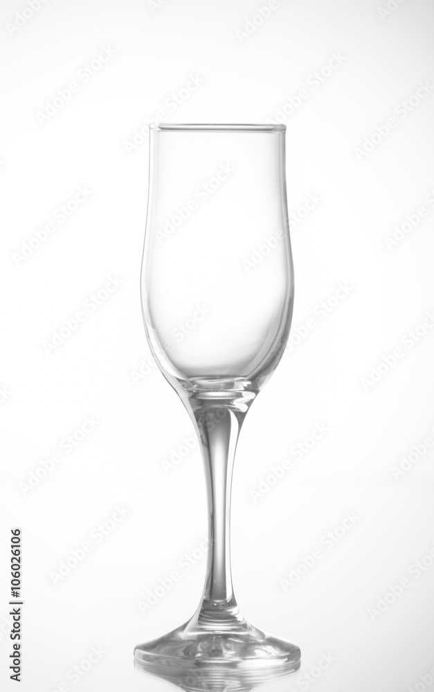 Isolated empty wineglass on a white background. Isolated empty wineglass on a white background.