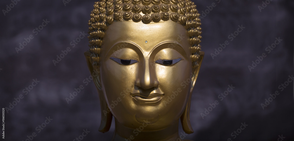 Golden Buddha statue close up