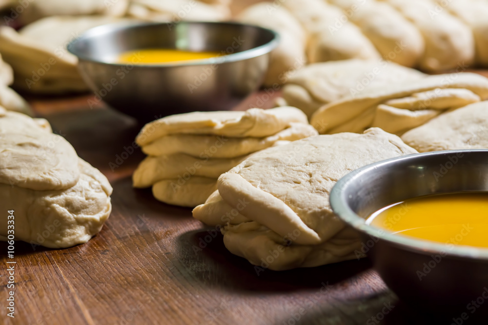 Confectioners knead the dough.