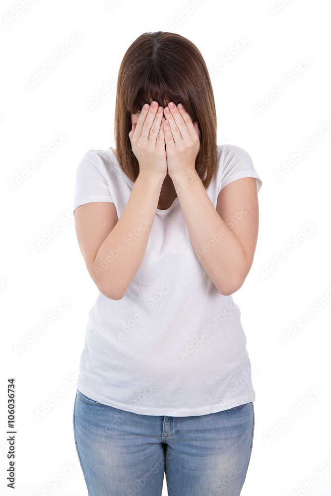 young woman crying and covering face with hands isolated on whit young woman crying and covering face with hands isolated on whit