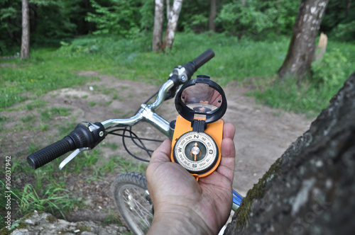 journey by bike with a compass.