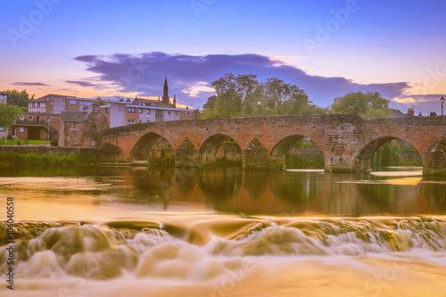 The old bridge and River Nith at Dumfries, Scotland. photo
