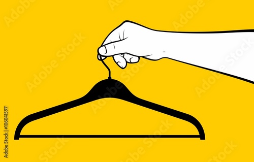 Hand holding hanger