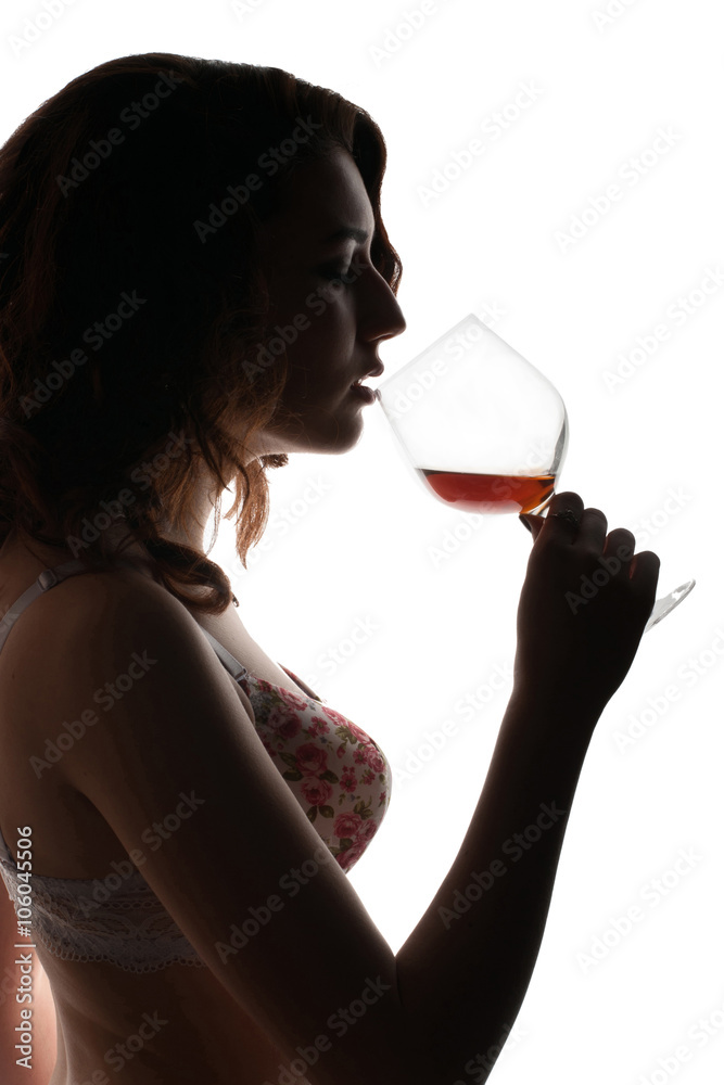 silhouette female with glass and wine silhouette female with glass and wine