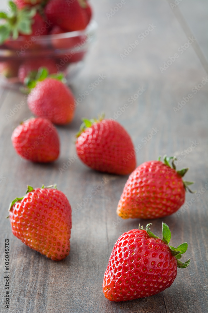 strawberries on wood background