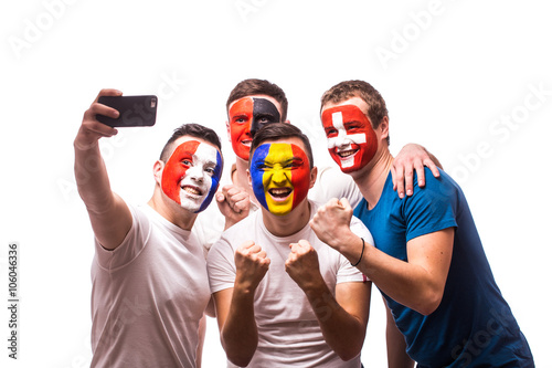 Εκτύπωση καμβά Group of football fans of their national team taking selfie photo on white background