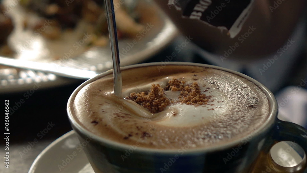 Person adding brown sugar to coffee in cafe, super slow motion 240fps
Person adding brown sugar to coffee in cafe, super slow motion 240fps