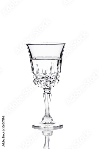 the glass of vodka on white background