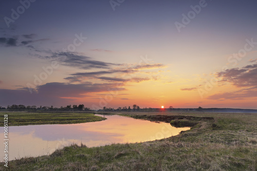 Spring countryside sunset over the river