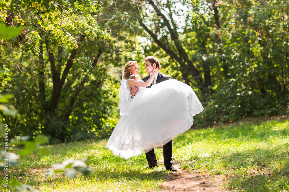 Bride and groom having a romantic moment on their wedding day Bride and groom having a romantic moment on their wedding day