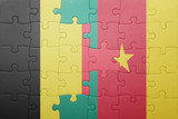puzzle with the national flag of belgium and cameroon