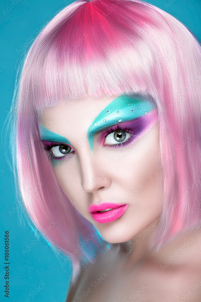 Closeup Portrait of sexy woman with creative makeup and rose quartz hairs on serenity background