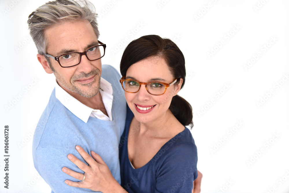 Middle-aged couple with eyeglasses on white background Middle-aged couple with eyeglasses on white background