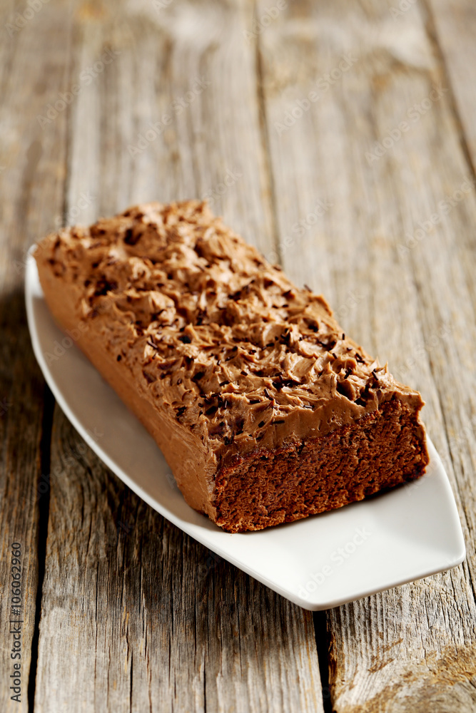 Chocolate cake on a grey wooden background Chocolate cake on a grey wooden background