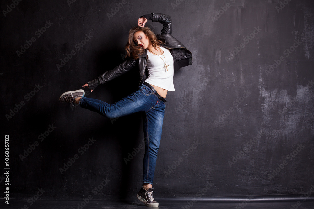 model girl dancing on a black background