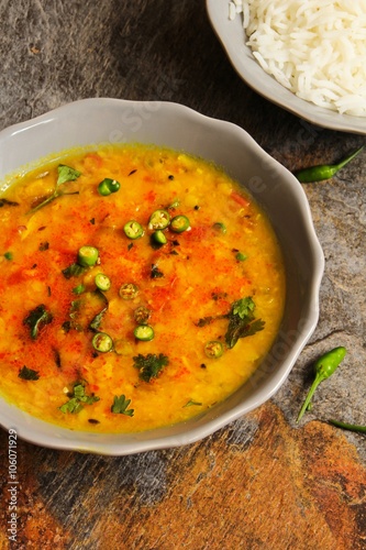 Dal Indian lentil curry soup with rice on side