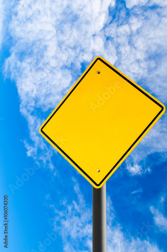 Empty road sign against blue sky with copy space. Vertical orientation. Conceptual