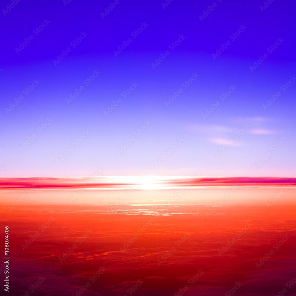 Sunset scene. Sunset above the clouds Sunset scene. Sunset above the clouds