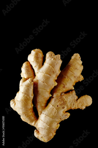 Ginger root. Isolated on black background.