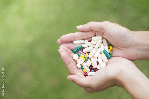 hands with pills and drug, healthcare concept