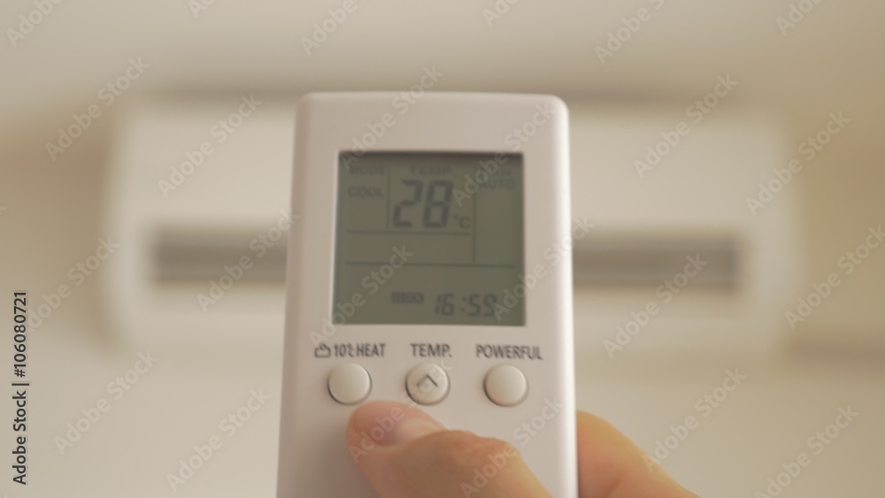 Setting lower temperature on air conditioner remote control 4K 3840X2160 UltraHD footage - Lowering down room temperature on air-con remote 4K 2160p UHD video Setting lower temperature on air conditioner remote control 4K 3840X2160 UltraHD footage - Lowering down room temperature on air-con remote 4K 2160p UHD video