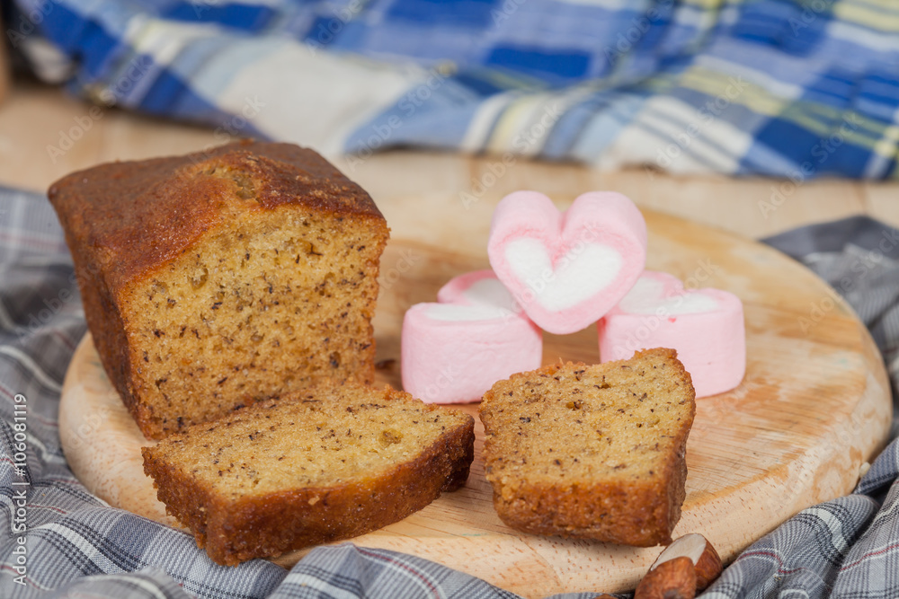 Homemade banana bread sliced on a table . rustic style Homemade banana bread sliced on a table . rustic style