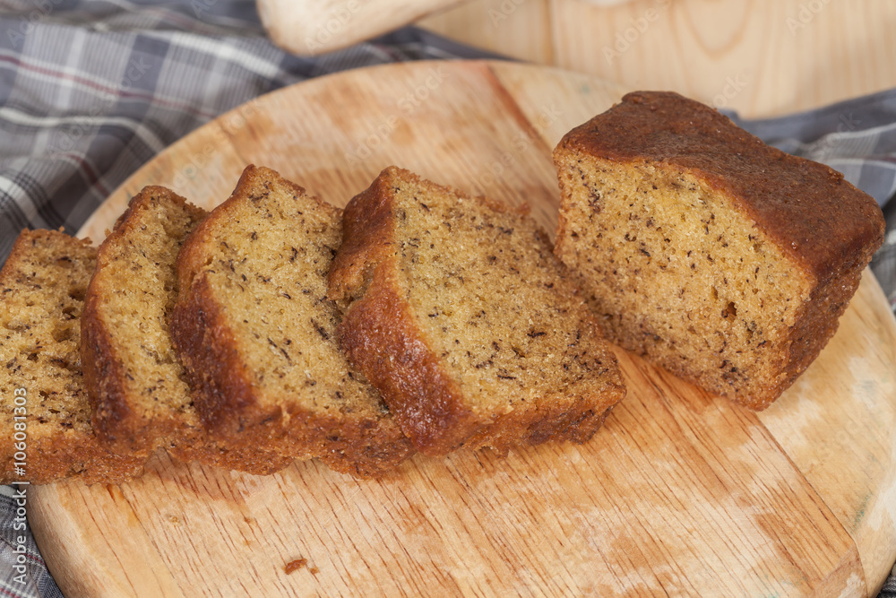 Homemade banana bread sliced on a table . rustic style Homemade banana bread sliced on a table . rustic style