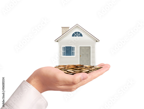 Fotografie holding house representing home ownership