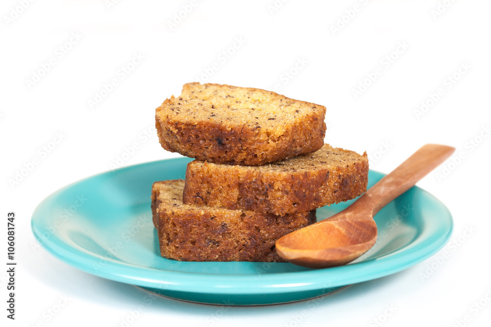 Homemade banana bread sliced on white background Homemade banana bread sliced on white background
