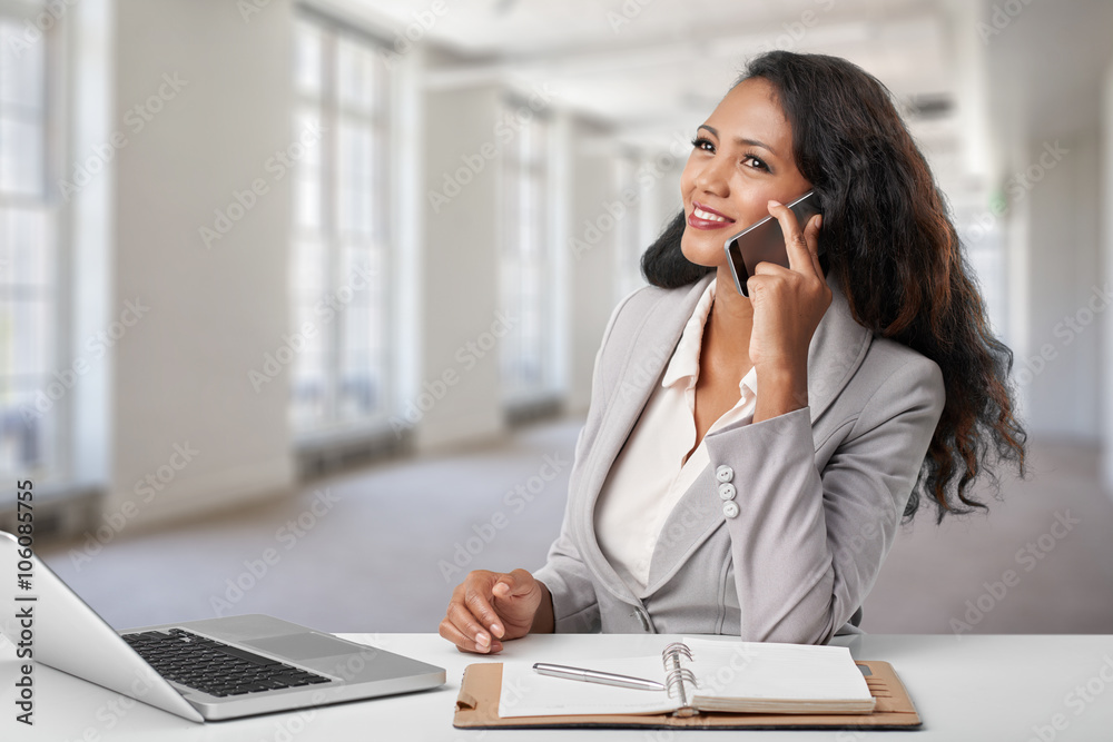 Portrait of attractive female entrepreneur having phone talk Portrait of attractive female entrepreneur having phone talk