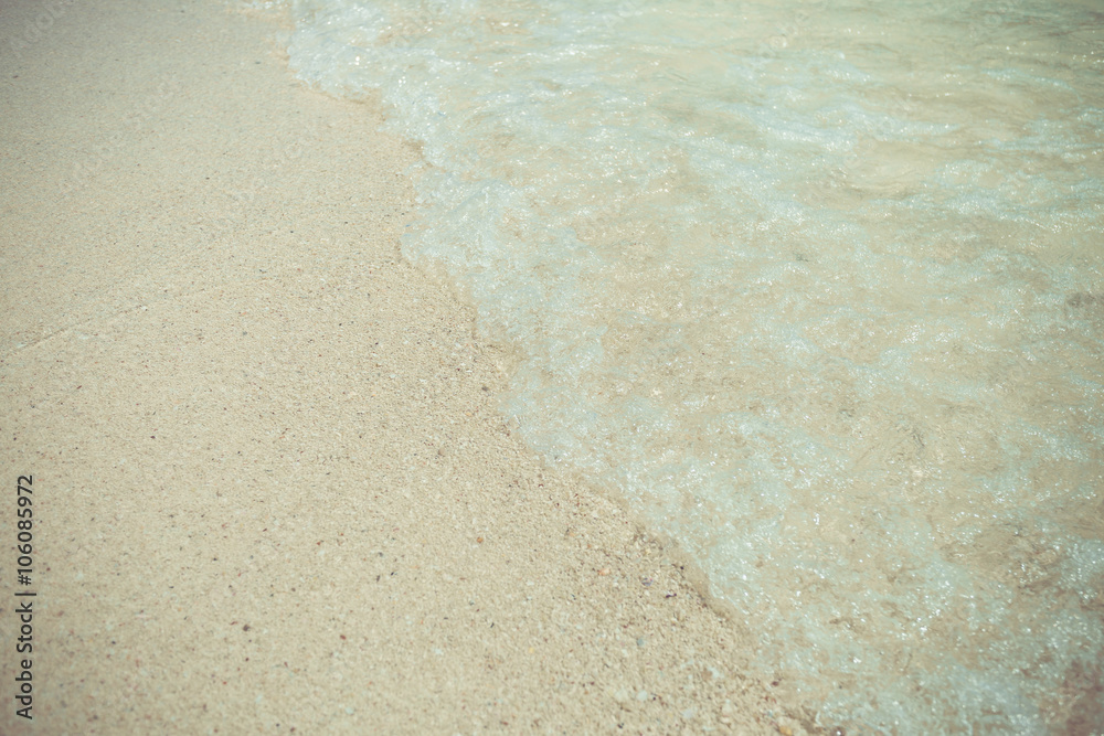 wave of the sea on sand beach