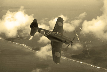 Acrylglasbilder Alte Flugzeuge Japanisches Jagdflugzeug über dem Pazifik  © Keith Tarrier