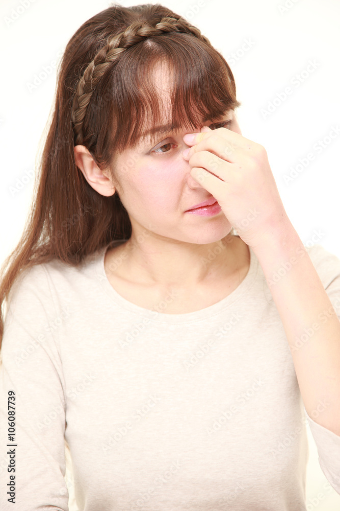 woman suffers from Asthenopia woman suffers from Asthenopia