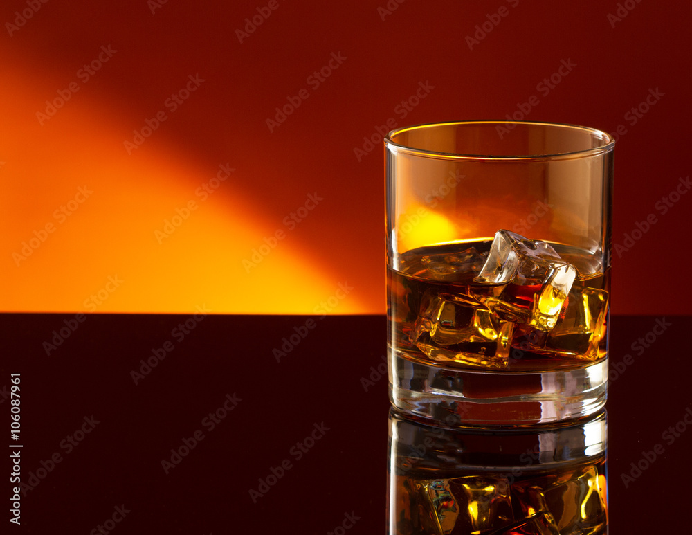 Glass of scotch whiskey and ice Glass of scotch whiskey and ice