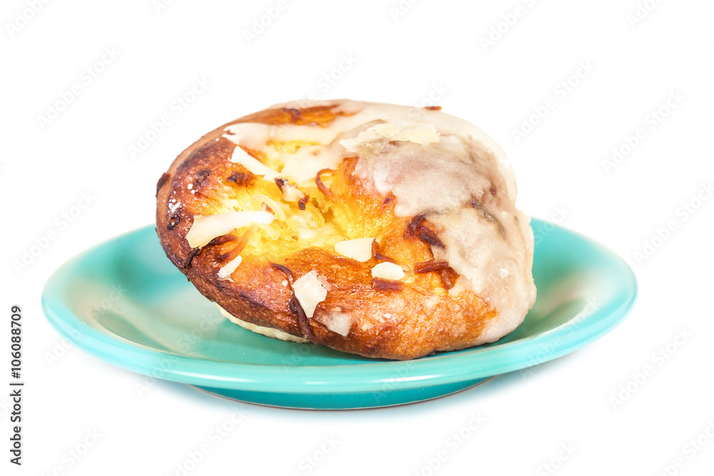 coconut bread in a plate on white background