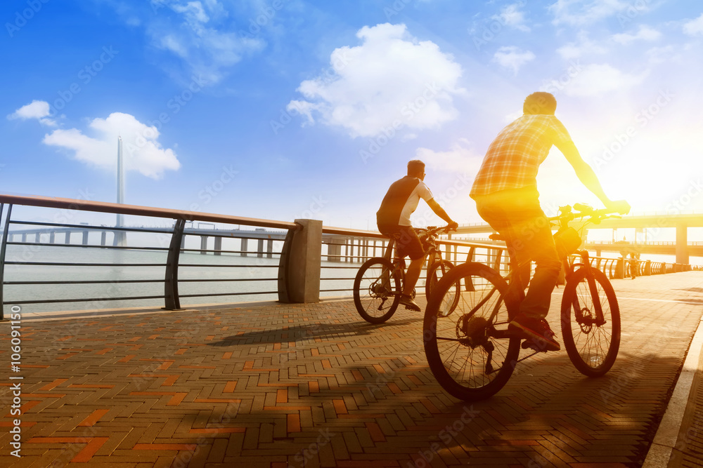 Fototapeta premium Dreamy sunset and healthy life.Fields and bicycle