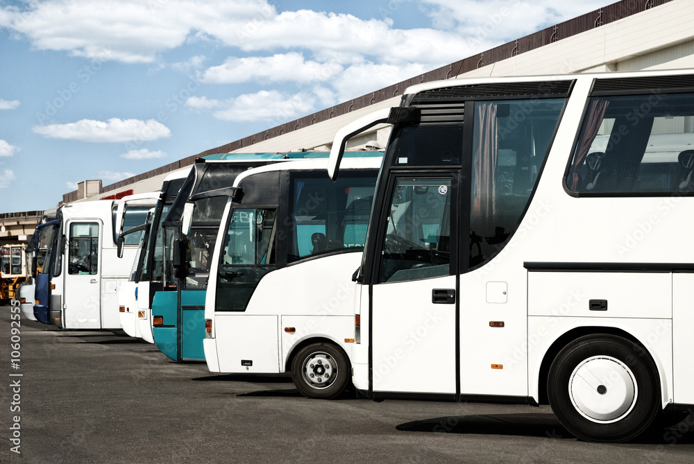 buses at the bus station with cloudy sky