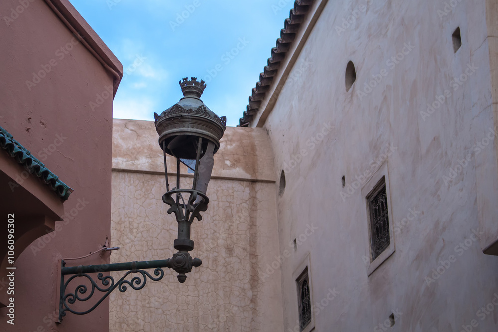 Street of medina with lantern, Marrakesh, Morocco