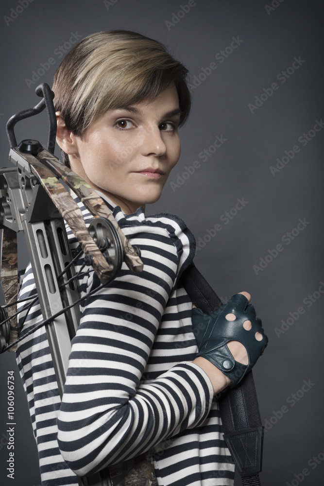 young woman with a crossbow