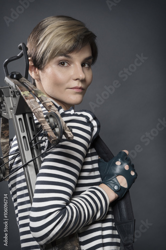 young woman with a crossbow