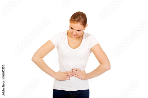 Young woman with stomach ache