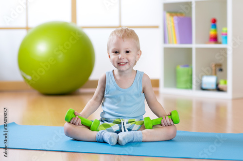Child boy ready to fitness exercises